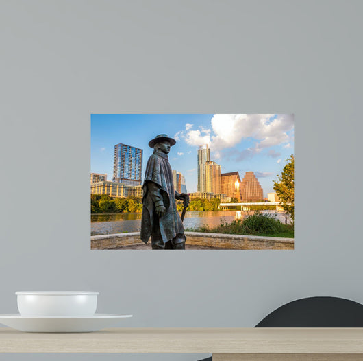 Stevie Ray Vaughan statue in front of downtown Austin and the Co Wall Decal