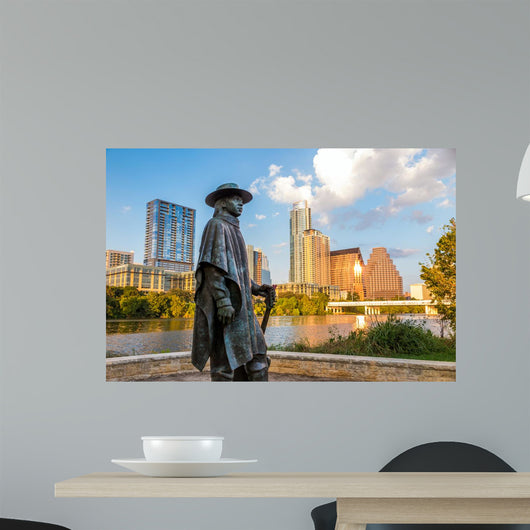 Stevie Ray Vaughan statue in front of downtown Austin and the Co Wall Decal