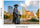 Stevie Ray Vaughan statue in front of downtown Austin and the Co Wall Decal