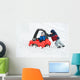 Young Boy Gives a Push to his Brother's Car Stuck in the Snow Wall Decal