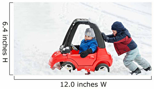 Young Boy Gives a Push to his Brother's Car Stuck in the Snow Wall Decal