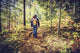 Mother Hiking with Baby in a Forest - Retro Filtered Wall Decal