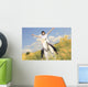 A white horse on yellow flower field with a rider. Wall Decal