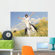 A white horse on yellow flower field with a rider. Wall Decal
