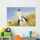 A white horse on yellow flower field with a rider. Wall Decal