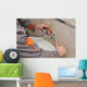 Plumber hands fixing water  tap with spanner, faucet and tool Wall Decal