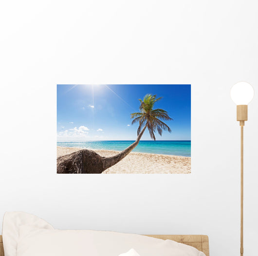 Palm tree on caribbean beach Wall Decal