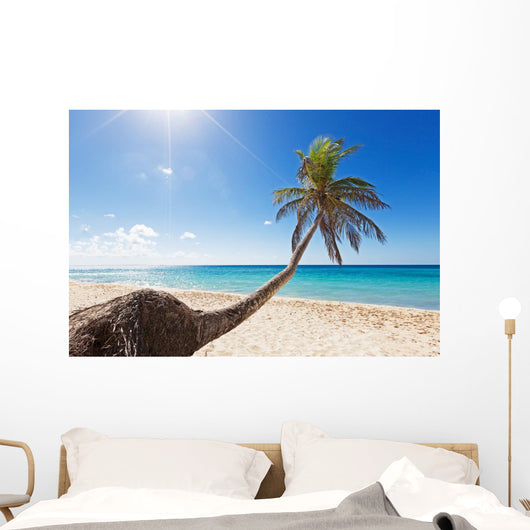 Palm tree on caribbean beach Wall Decal