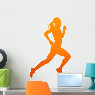 Running Woman. Abstract Isolated Vector Silhouette Wall Decal shown on a wall