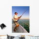 Angler fisherman fighting big fish on the ocean from the boat Wall Decal