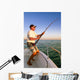 Angler fisherman fighting big fish on the ocean from the boat Wall Decal