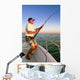 Angler fisherman fighting big fish on the ocean from the boat Wall Decal
