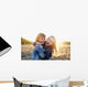 Two young girls have fun outside Wall Decal