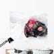 Children playing in a snow cave Wall Decal