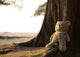 teddy bear sitting against a tree Wall Decal