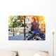 Biker girl in a leather jacket on a motorcycle Wall Decal