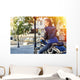 Biker girl in a leather jacket on a motorcycle Wall Decal