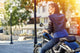 Biker girl in a leather jacket on a motorcycle Wall Decal
