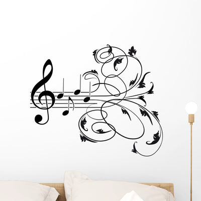 Treble Clef And Musical Notes With Decorative Floral Swirls Wall Decal shown on a wall