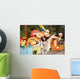 Amusement park rides. A young woman is happy and jumps. Wall Mural