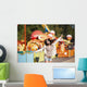 Amusement park rides. A young woman is happy and jumps. Wall Mural