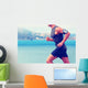 Cardio runner running listening smartphone music Wall Mural