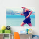 Cardio runner running listening smartphone music Wall Mural