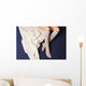 Female legs in warm woolen socks Wall Mural