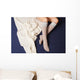 Female legs in warm woolen socks Wall Mural