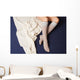 Female legs in warm woolen socks Wall Mural