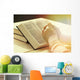 Hands of old woman with Bible on table Wall Mural