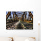 Looking Forward Over Old Abandoned Rusty Train Bridge Wall Mural