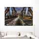 Looking Forward Over Old Abandoned Rusty Train Bridge Wall Mural