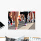 marathon runner legs running on city street Wall Mural