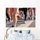 marathon runner legs running on city street Wall Mural