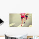 marathon runner legs running on city street Wall Mural