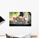 Fitness girl running on treadmill. With muscular legs in gym. Wall Mural