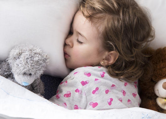 Sleeping Child With Toys Wall Decal