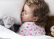 Sleeping Child With Toys Wall Decal