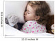 Sleeping child with toys Wall Mural