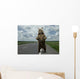 Brown bear standing on the road. Wall Mural
