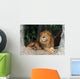 Lion resting on a tree Wall Mural