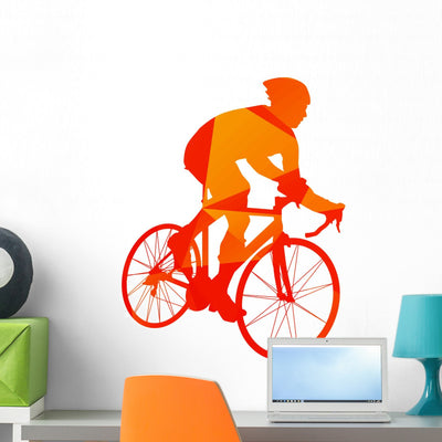 Abstract Orange Cyclist Silhouette Wall Decal shown on a wall