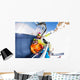 Mom with boy on ski lift ropeway chair Wall Mural
