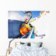 Mom with boy on ski lift ropeway chair Wall Mural