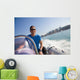 man rushes inflatable boats Wall Mural