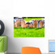 Family relaxing on the grass Wall Mural