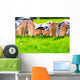 Family relaxing on the grass Wall Mural