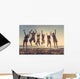 Multiracial group of people jumping at beach Wall Mural