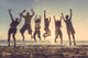 Multiracial Group Of People Jumping At Beach Wall Decal